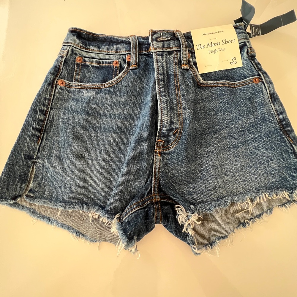 The mom short high rise denim shorts